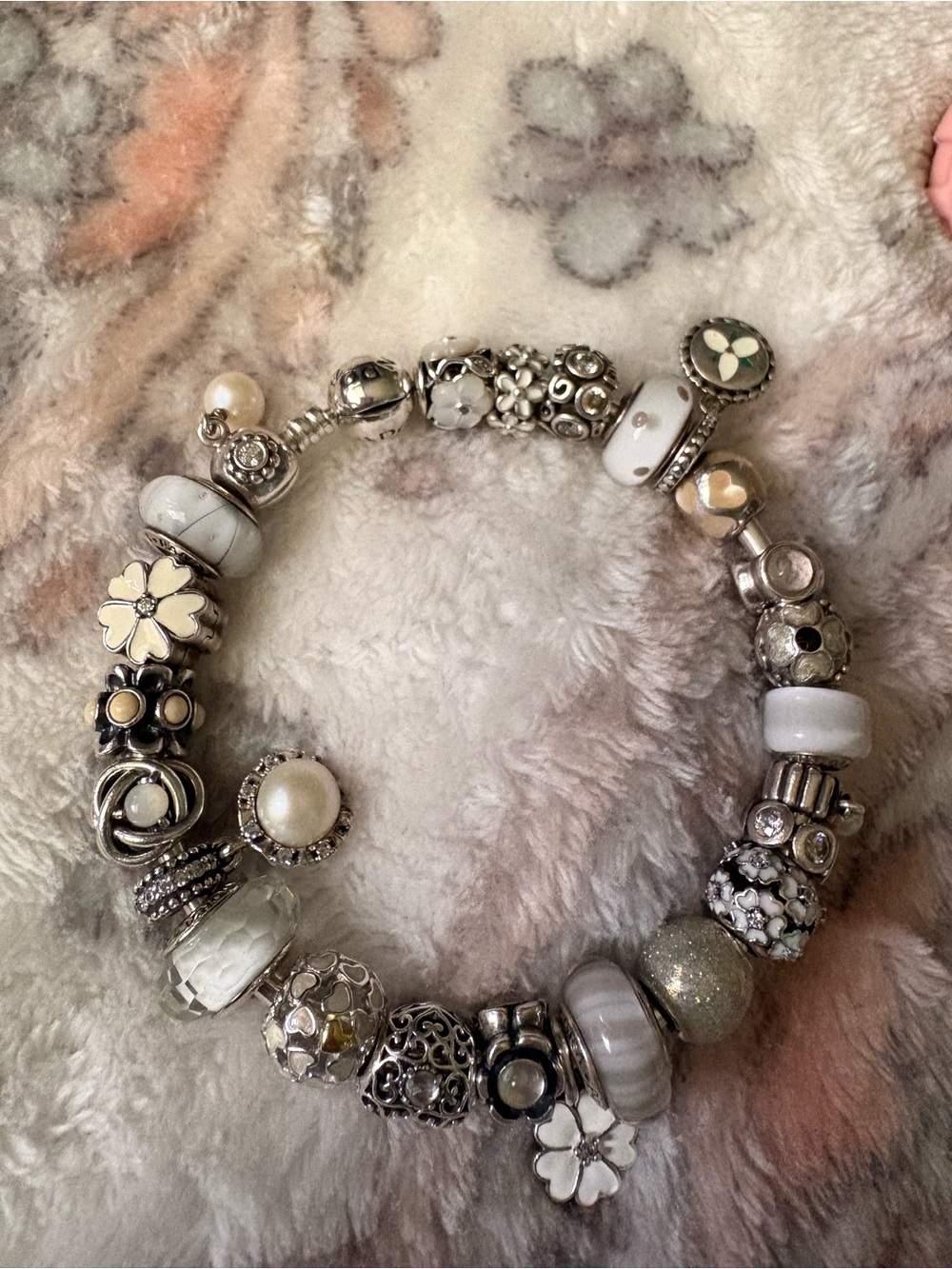 Pandora bangle with white pandora charms